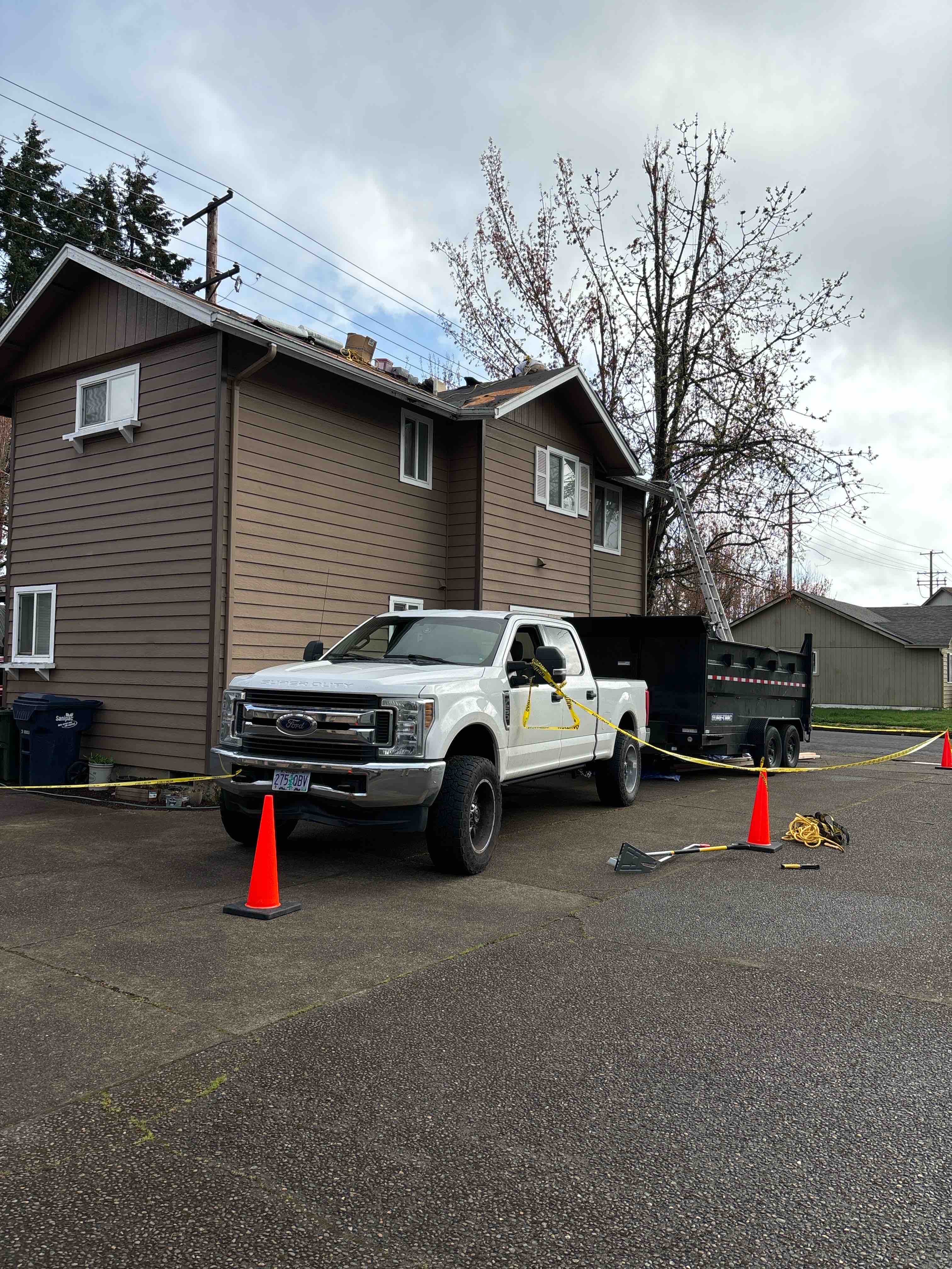 builders fixing roof
