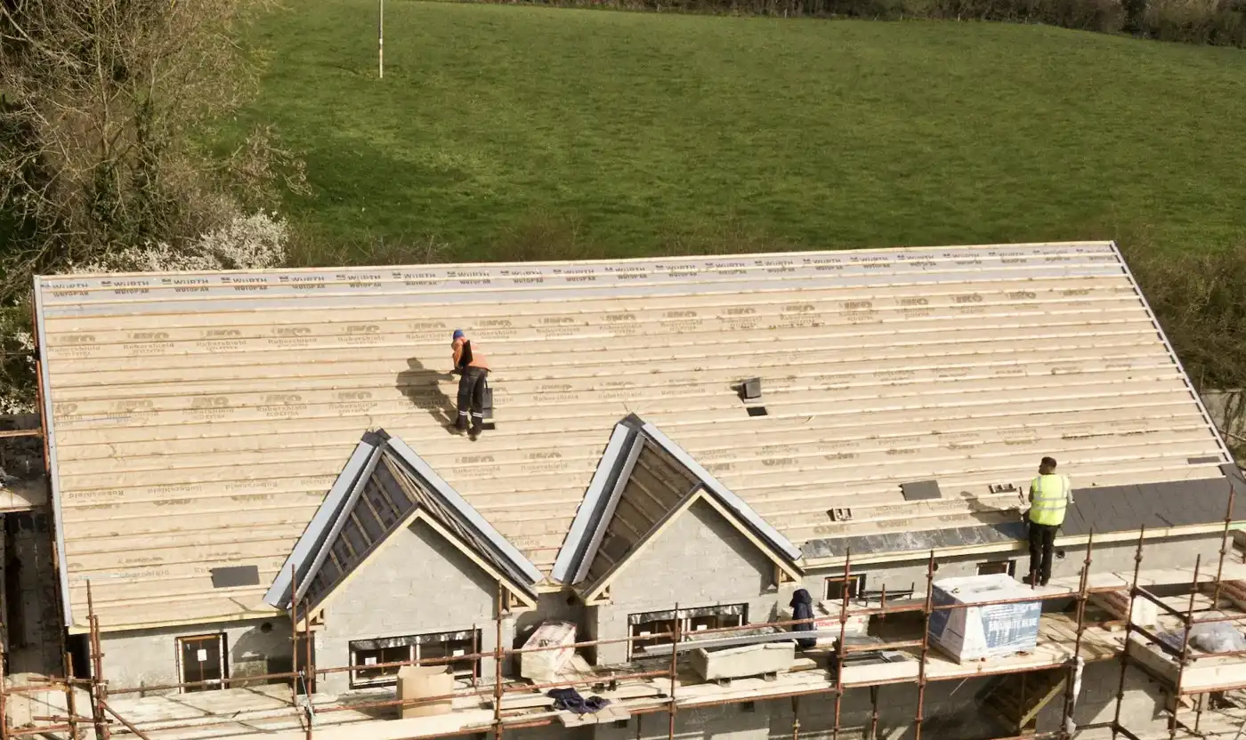 contractor inspecting roof