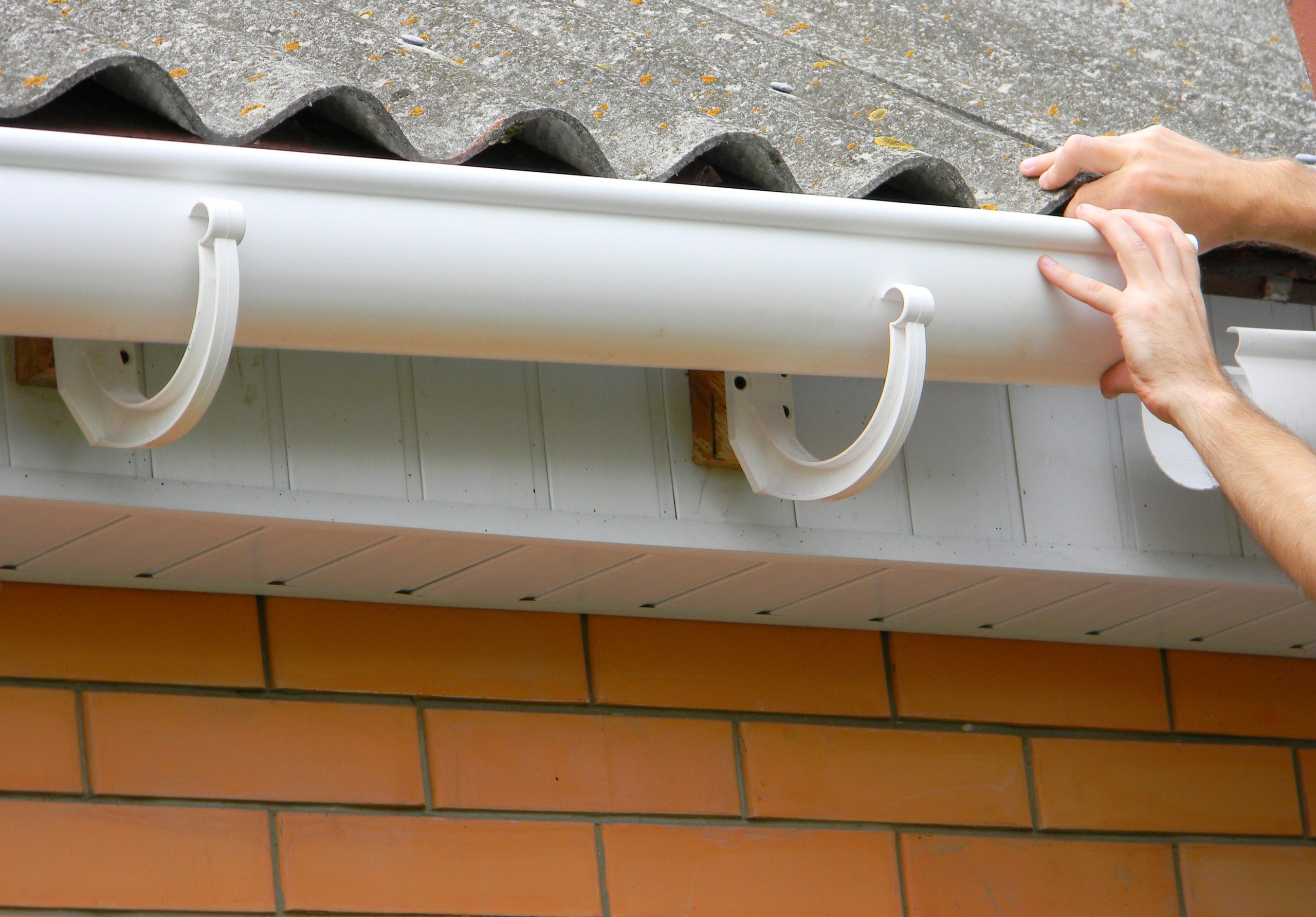 Contractor,Installing,Plastic,Roof,Gutter.,Plastic,Guttering,,Rain,Guttering,&